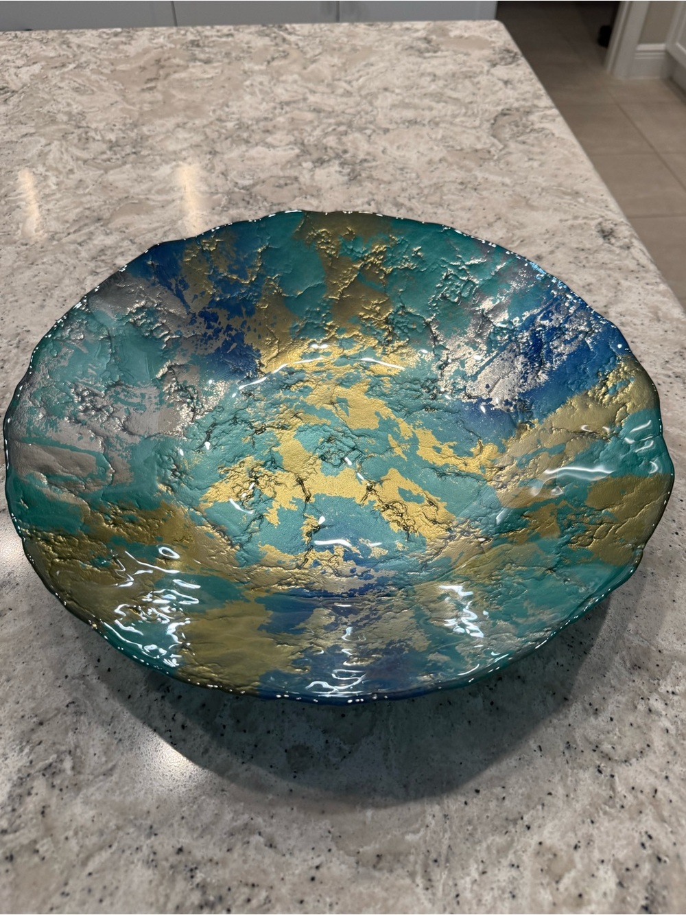 NWT decorative display bowl in shades of silver, gold, aqua, and royal blue